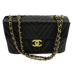 Chanel Black Chevron Quilted Lambskin Leather Medium Classic Flap Shoulder Bag