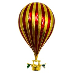 MMA baloon, broche de défilé vintage en émail doré