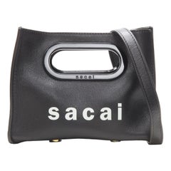SACAI black leather white logo print crossbody micro shopper tote bag