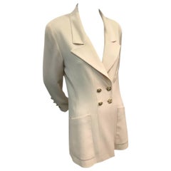 1990s Chanel Cream Double Breasted Jacket with Notched Collar and Logo Buttons