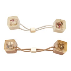 LOUIS VUITTON 2X gold tone LV monogram floral charm hair cube white brown