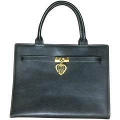 Retro MOSCHINO black leather tote bag in Kelly purse style with iconic M charm