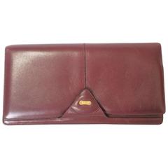 Retro Bally wine leather clutch bag, party and classic purse with golden logo.