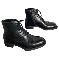 Used Prada black leather boots