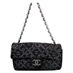 Chanel evening bag made of black jacquard fabric, woven Chanel chain and logo!