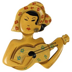 Art Deco Bakelite Musician Brooch