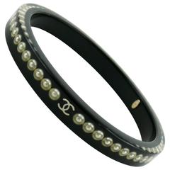 Chanel Black Lucite Bangle Bracelet Pearl and Logo Inlaid