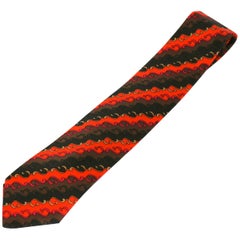Corbata con estampado de remolinos naranja y marrón de Pucci