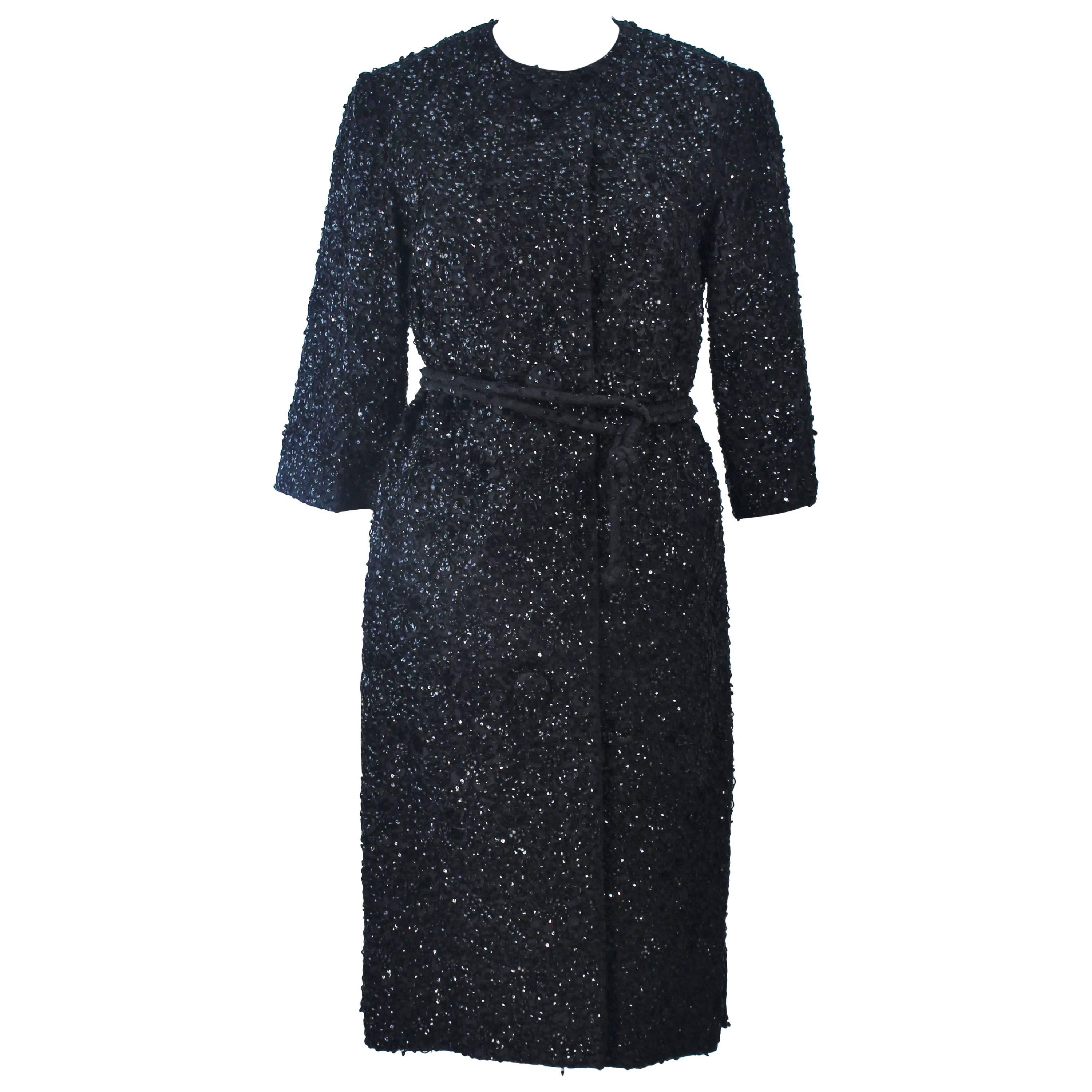 HAUTE COUTURE INTERNATIONAL 1960's Black Beaded Sequin Coat with Belt Size 6 For Sale