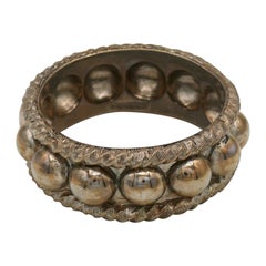 YVES SAINT LAURENT Bracelet vintage de couleur argent