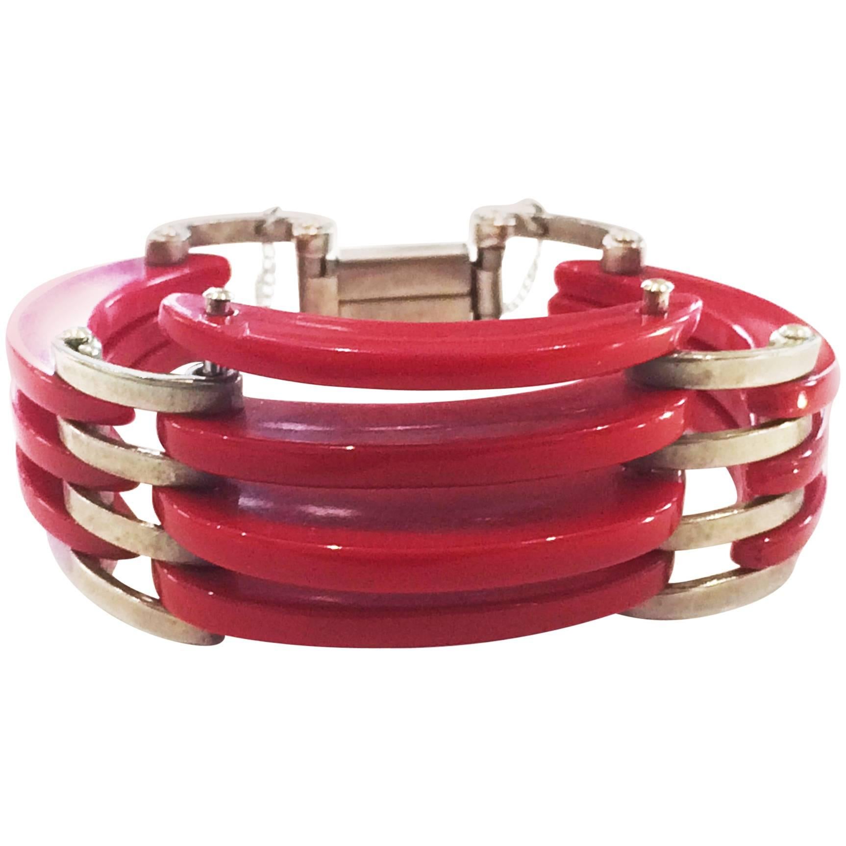 Rare red bakelite and chrome bangle attributed to Jacob Bengel