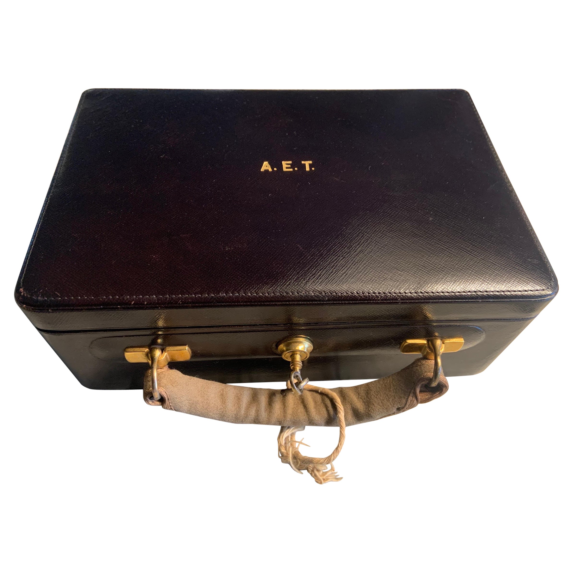 Cartier, Paris Black Leather and  Velvet Lined Jewelry Box and Key
