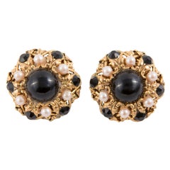 Boucles d'oreilles à clip en noir et or des années 1960