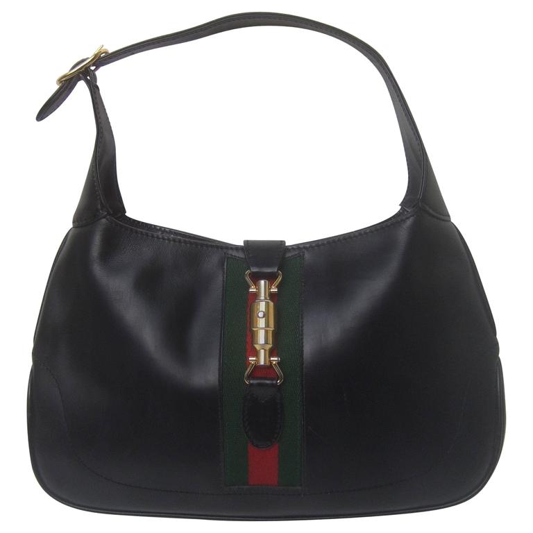 Gucci Italy Iconic Ebony Leather Jackie O Piston Handbag c 1970s at 1stDibs