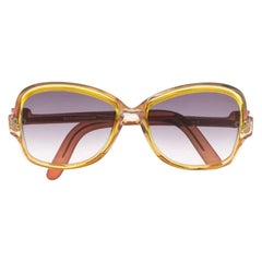 Yves Saint Laurent Retro yellow with brown earpiece 70s sunglasses