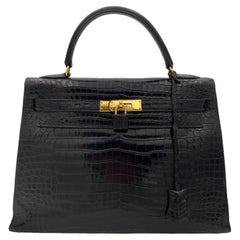 1998 Hermès Kelly 32 Schwarz Leder Top Handle Tasche