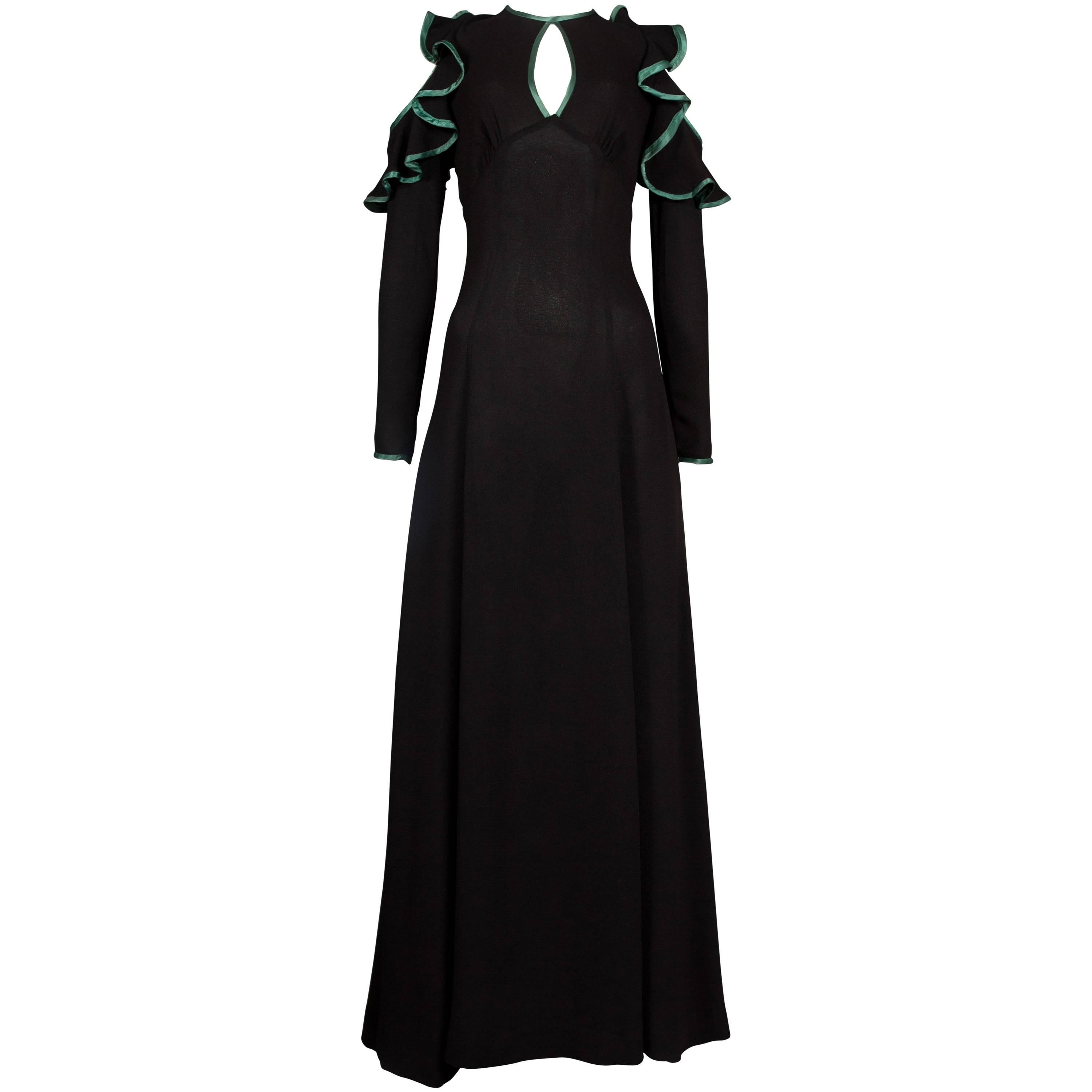 Ossie Clark black cold shoulder evening dress with green satin trim, circa 1968