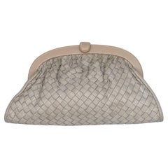 Used Bottega Veneta
woven beige leather clutch
bag