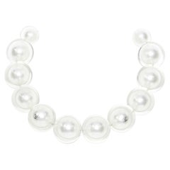 runway CHANEL KARL LAGERFELD AW17 resin coated pearl CC logo choker necklace