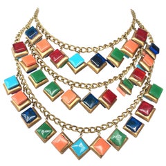 A striking three row glass square 'charm' necklace, 1930s.