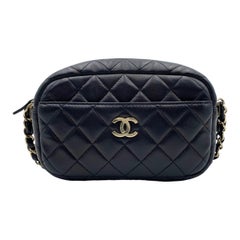 Chanel - Black Vertical Lambskin Pocket Camera Bag Large