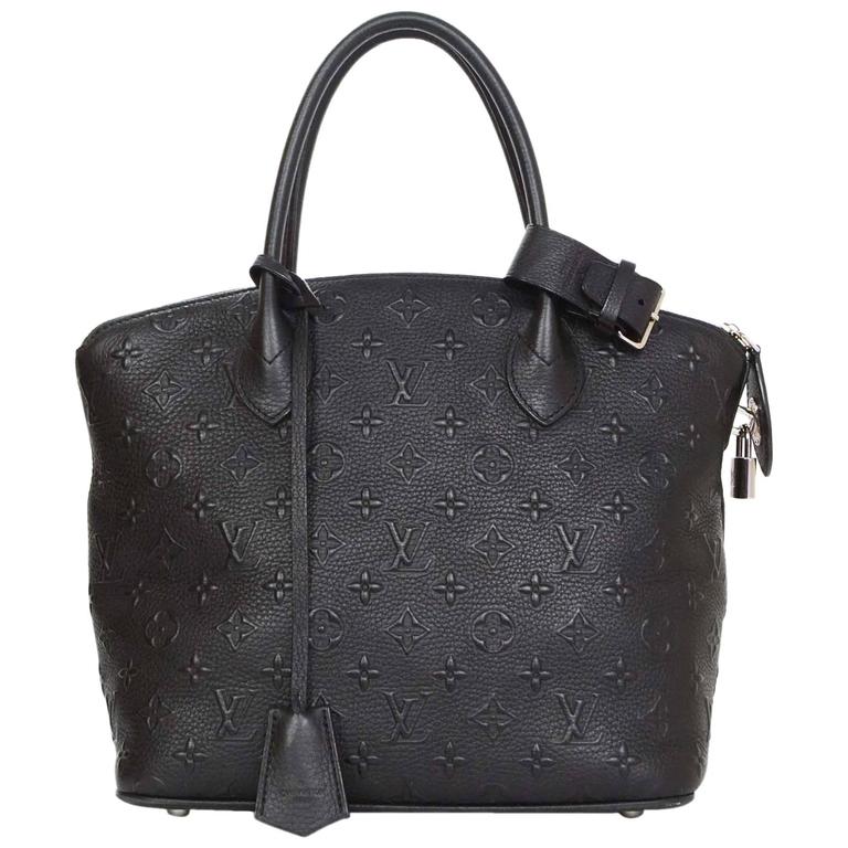 Louis Vuitton Black Leather Monogram Lockit Revaluation Bag rt. $3,800 For Sale at 1stdibs