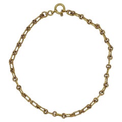 Vintage Chanel necklace from 1990 gold chain textured and intertwined CC pattern