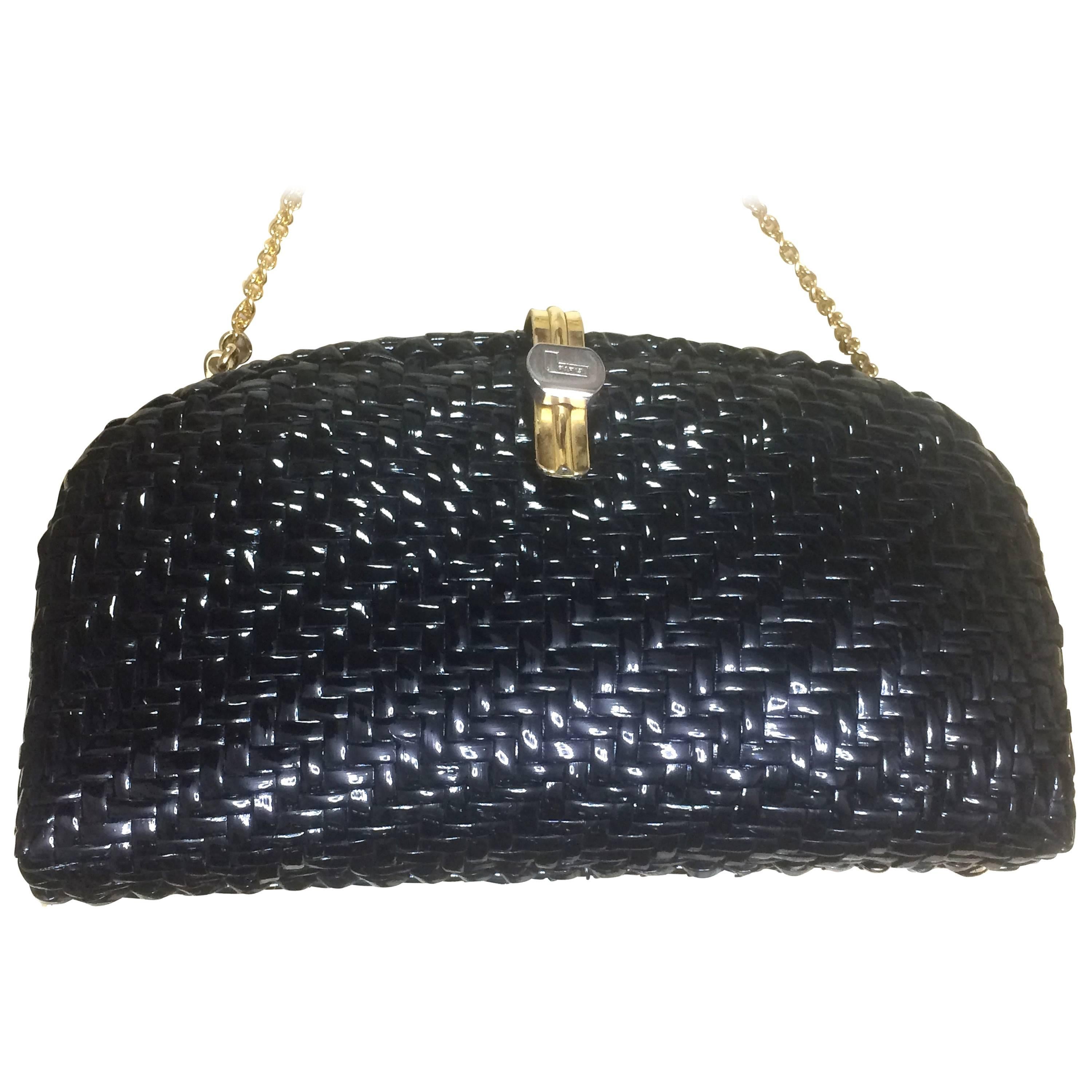 Vintage LANCEL, black bamboo woven clutch bag in round oval shape, chain strap For Sale