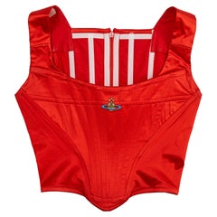 Used Vivienne Westwood red satin corset with embroidered orb,  c. 1990s