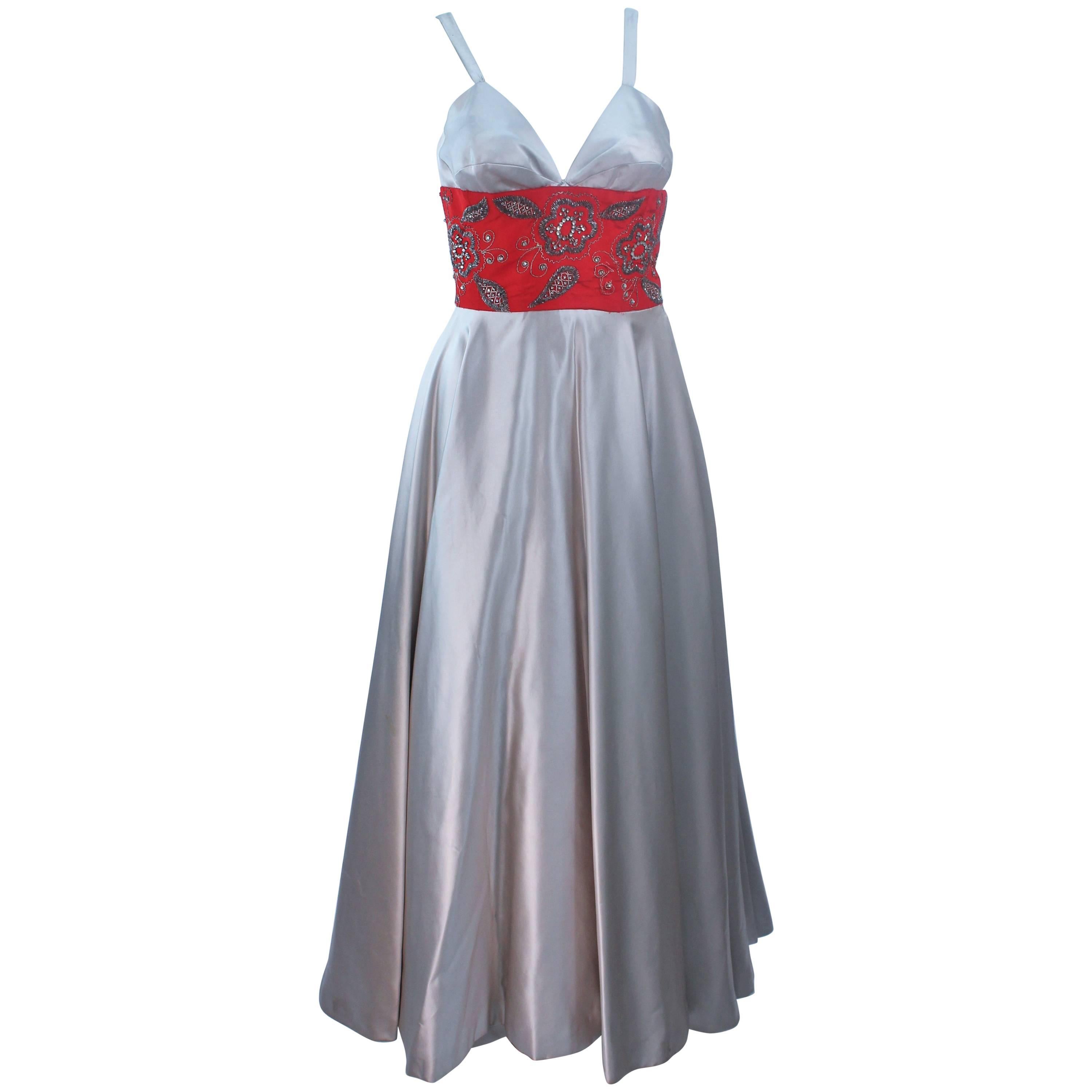 ELEANORA GARNETT 1950's Silver Silk Gown with Red Embellished Waist Size 2 For Sale