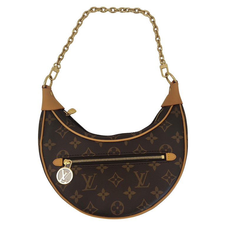 Sold at Auction: Louis Vuitton Brown Monogram Coated Canvas Mini Coussin  Shoulder Bag, the double vachetta leather straps with brass hardware,  openin