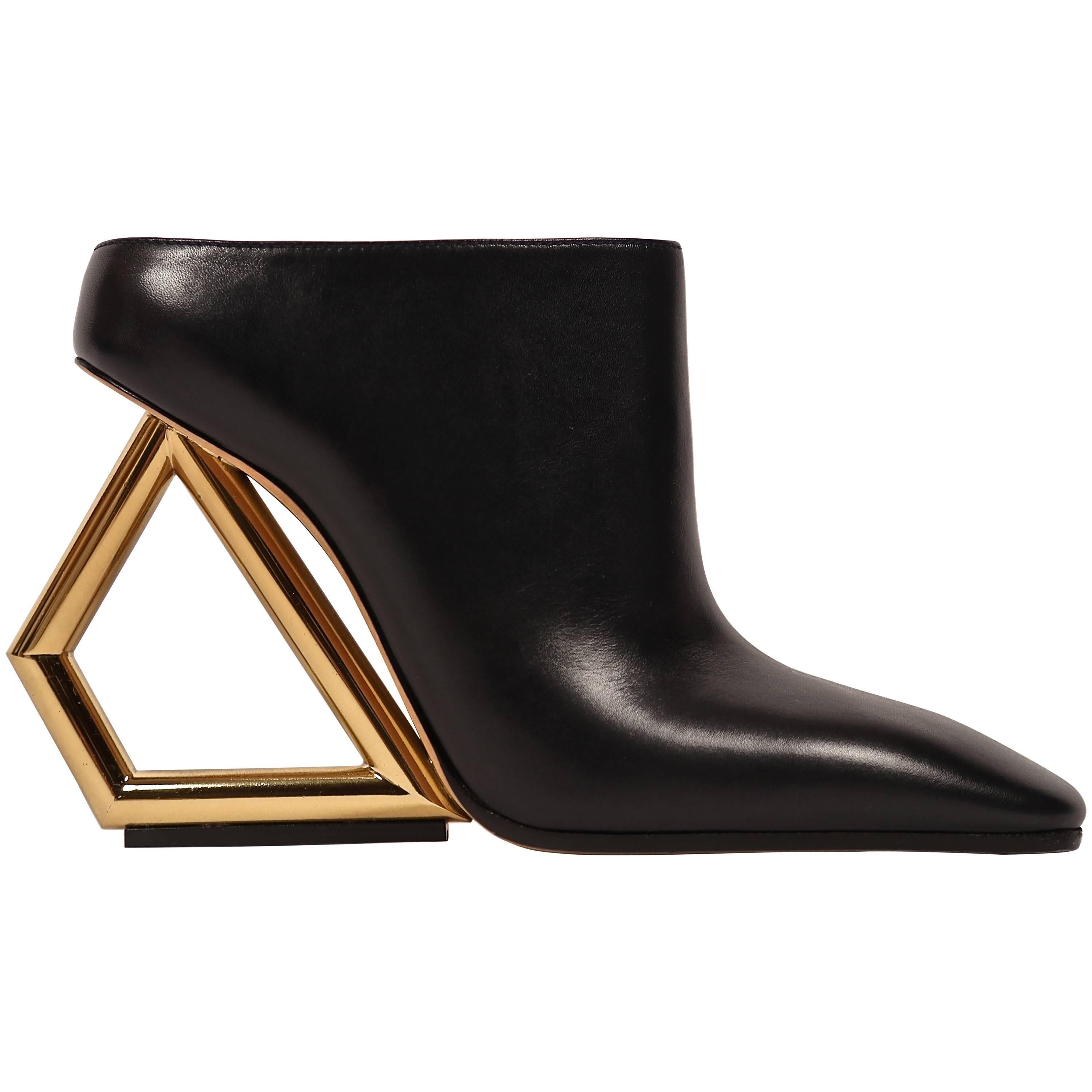 CELINE black leather mules with gold trapezoid heels - runway 2014