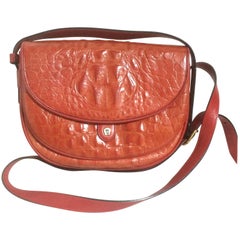 Vintage Etienne Aigner alligator embossed leather shoulder purse. Stunning color