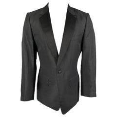 YVES SAINT LAURENT par Tom Ford - Manteau de sport en soie noire à revers clouté, taille 40