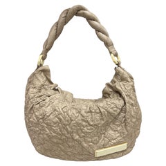 Louis Vuitton Olympe Nimbus sac à poignée supérieure en cuir beige Emprainte