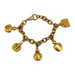 CHRISTIAN DIOR Parfums Vintage Gold Tone Charms Bracelet