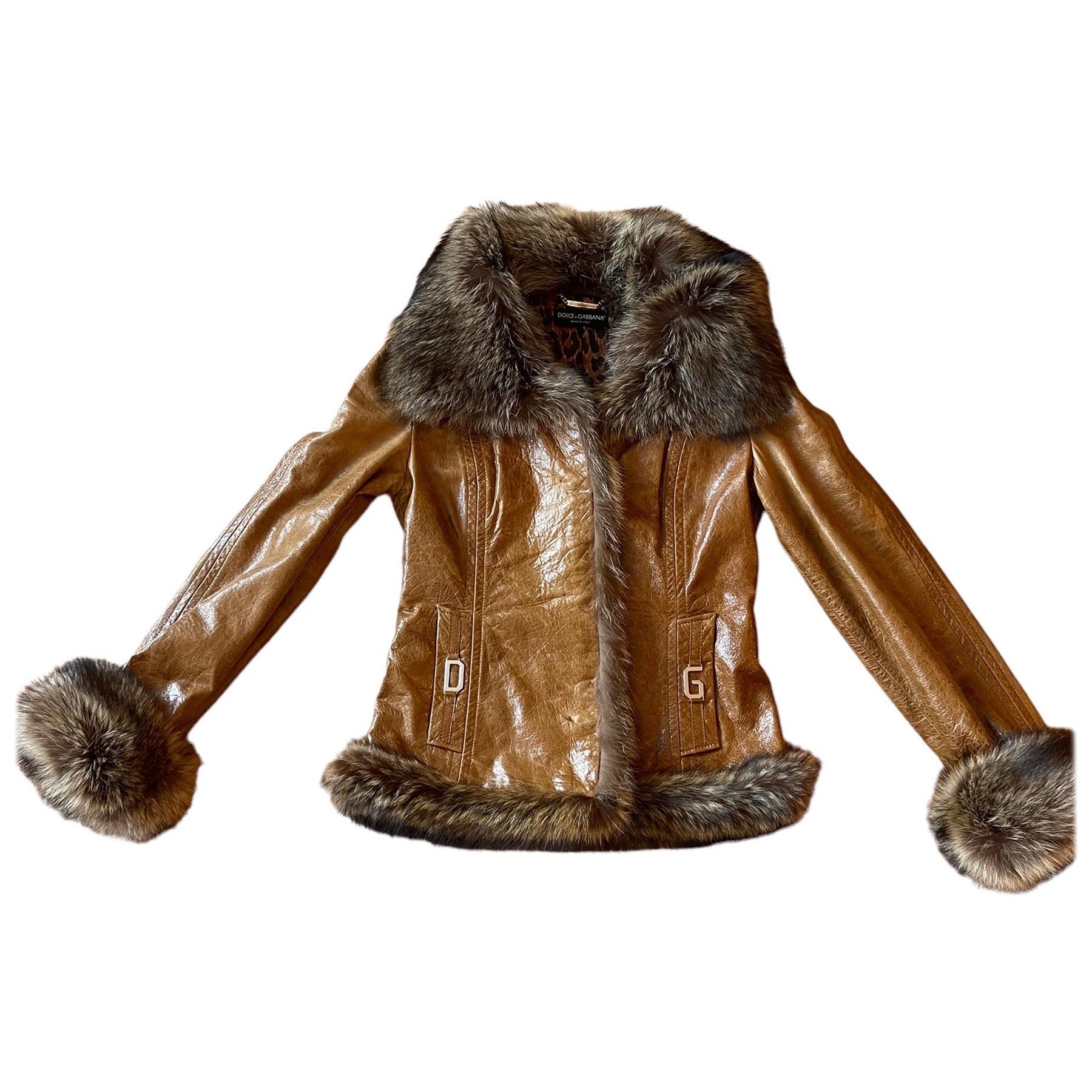 90s Vintage Dolce and Gabbana Leather and Beaver Fur Penny Lane Jacket 
Delicious brown leather, leopard print lining and beaver fur. 
D&G silver hardware detailing on front pockets. 
SO fun



Very good vintage condition. Light wear consistent with