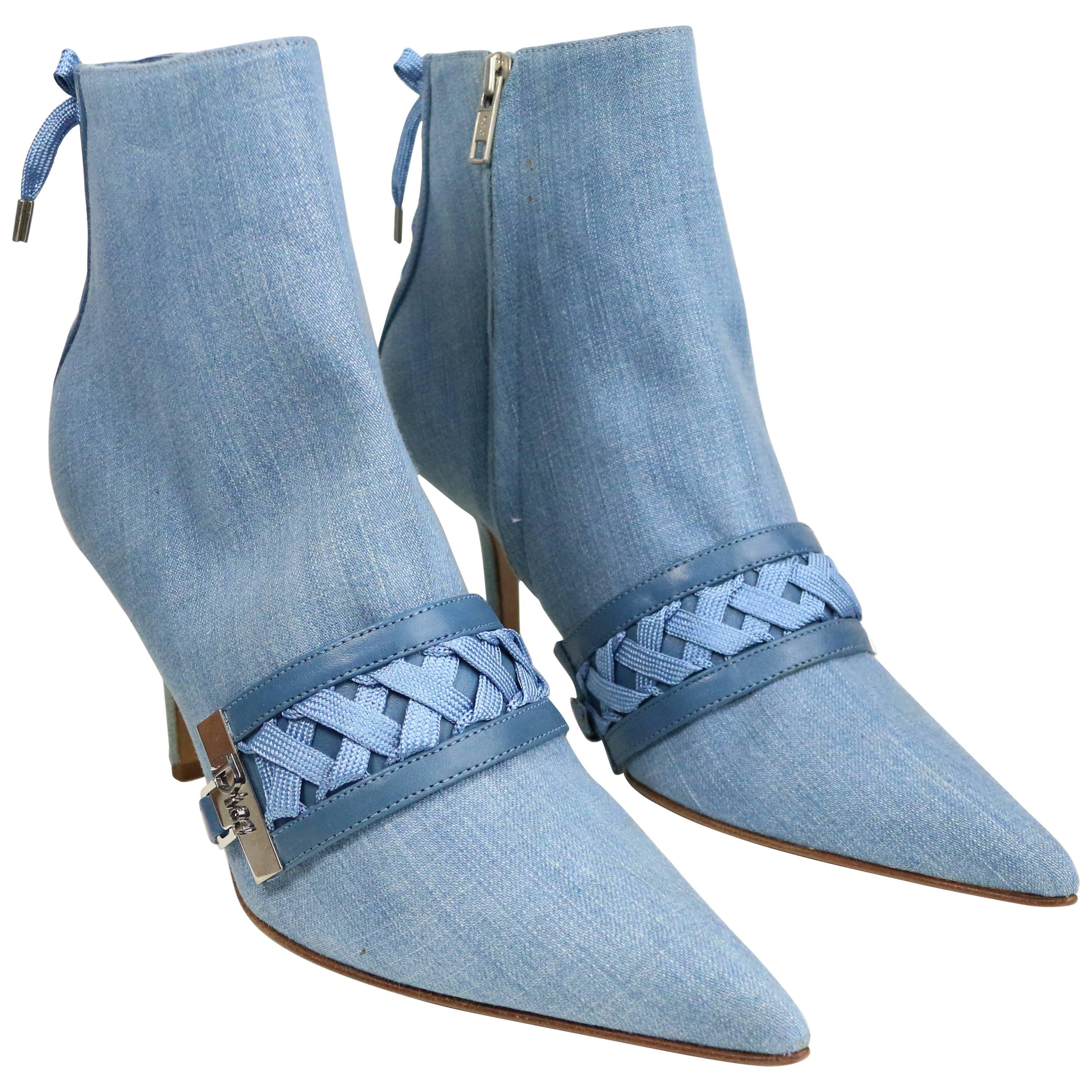 - Christian Dior by John Galliano denim pointed toe stiletto heels ankle boots. This beautiful ankle boots has a lot of details. Featuring lacing on the tail, removable decorative harness with lacing on the instep and zippers on the inside.  

-