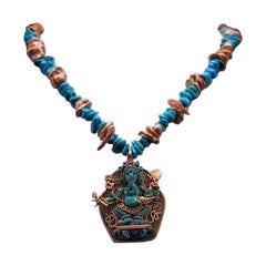 A.Jeschel, élégant collier pendentif Ganesh en turquoise.