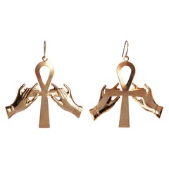 Boucles d'oreilles en or jaune 24 carats avec touches d'ankh