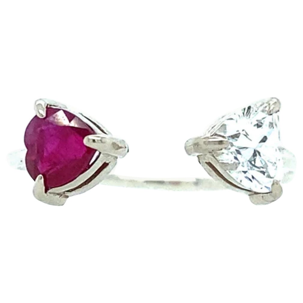 A true symbol love, Toi et Moi ring means you and me. A red Ruby heart and a .5 carat GIA diamond heart. Ruby is a stone of Divine creativity. It boosts your energy levels and promotes high self-esteem, intuition, and spiritual wisdom. Ruby is a