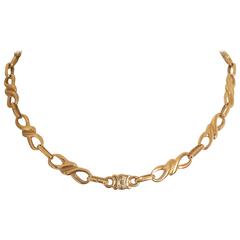MINT. Vintage Celine golden twisted chain necklace with blaison macadam charm