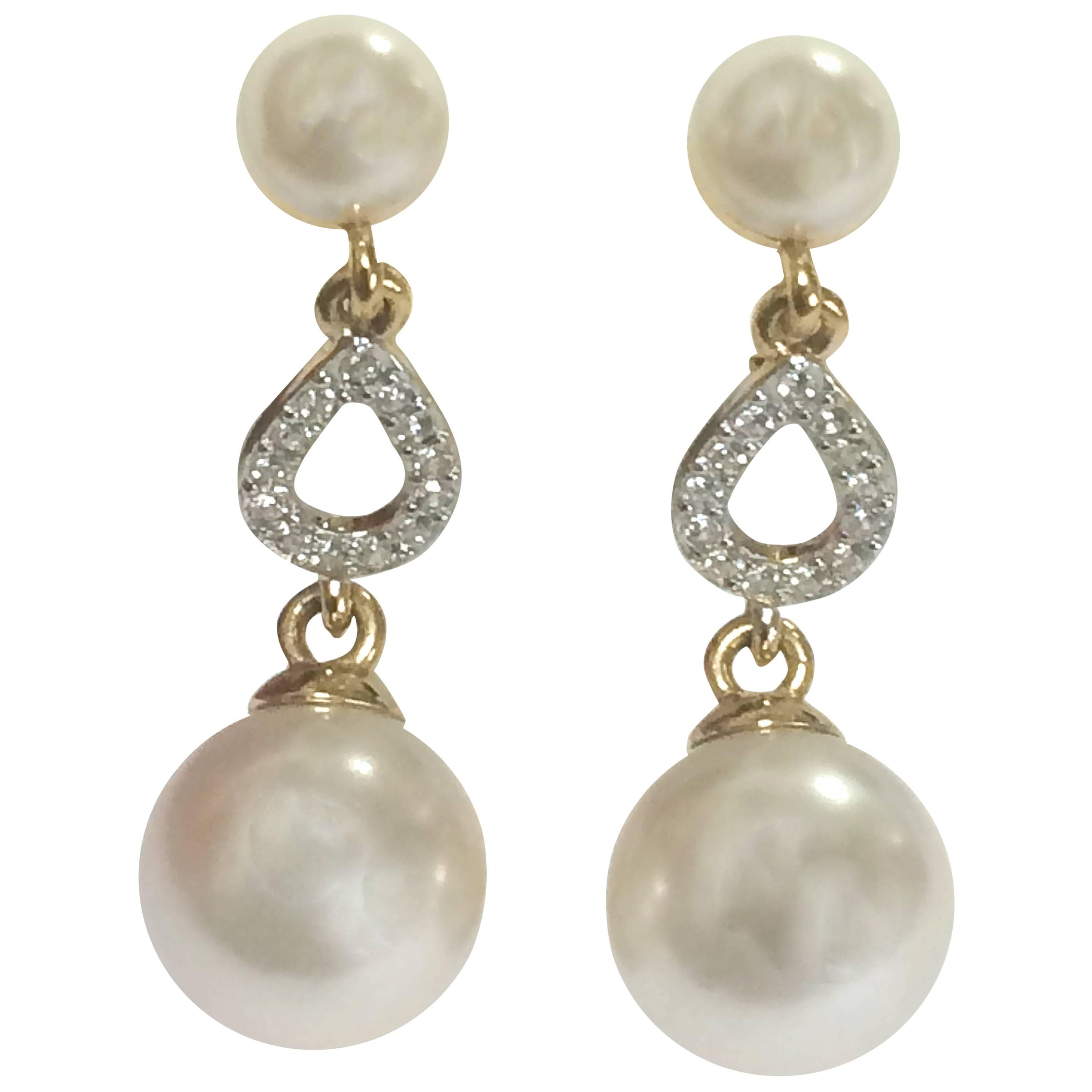 Vintage Nina Ricci white faux pearl and crystal stone teardrop dangling earrings