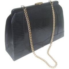 Sleek Ebony Lizard Skin Structured Handbag c 1960 9