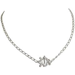 MINT. Vintage Christian Dior silver tone chain necklace with logo motif top.