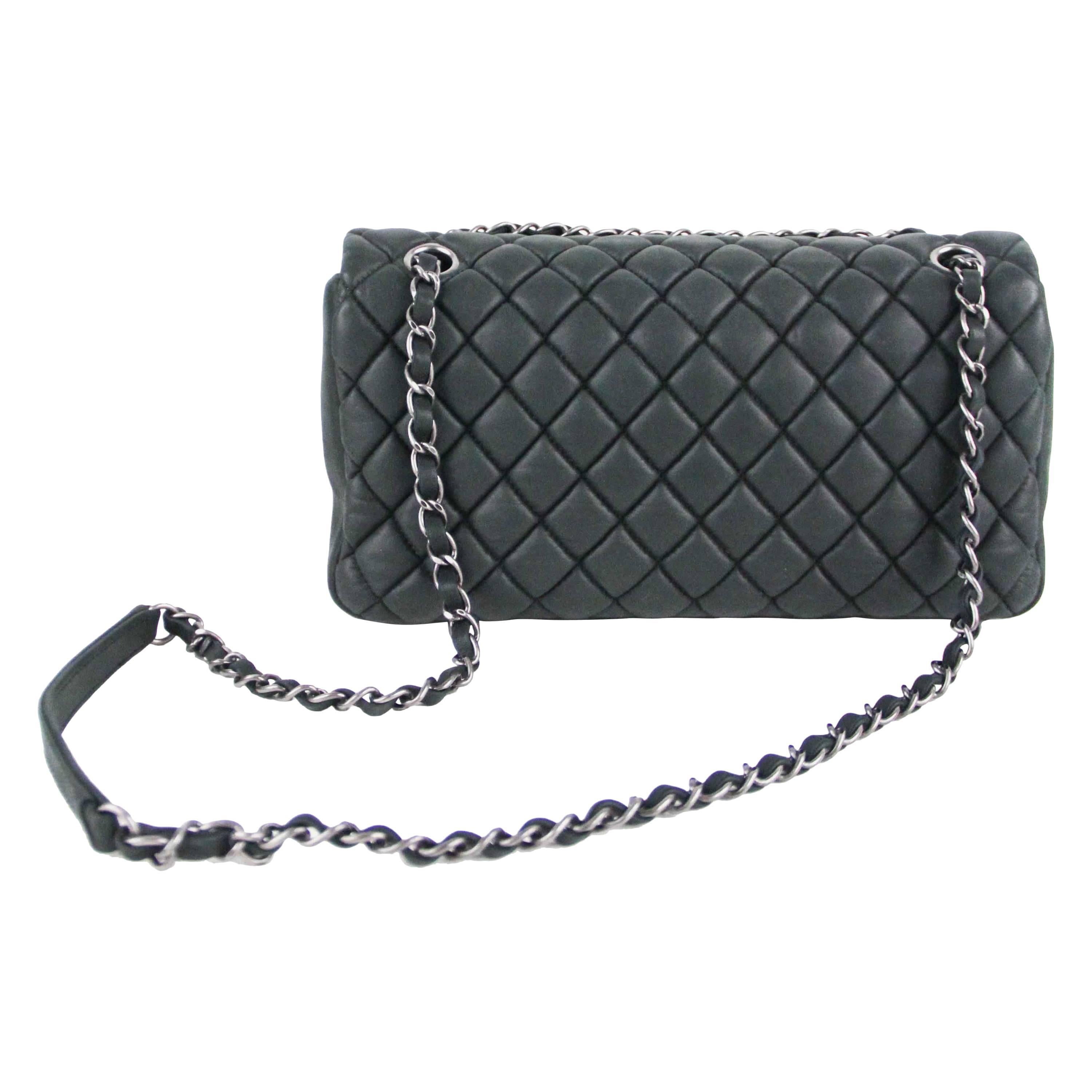 Offered is a Chanel glazed calfskin medium bubble flap shoulder bag.  Beautiful treatment and hard to find in this combination, black calfskin complimented by rhodium hardware.  Long chain link shoulder strap with a flat leather piece at shoulder. 