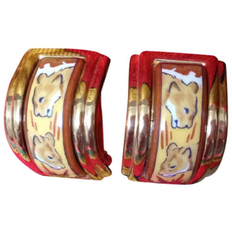  MINT. Vintage Hermes cloisonne porcelain golden earrings with twin lions design