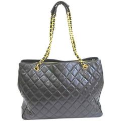 Vintage CHANEL black lambskin large tote bag with golden chains and jumbo CC