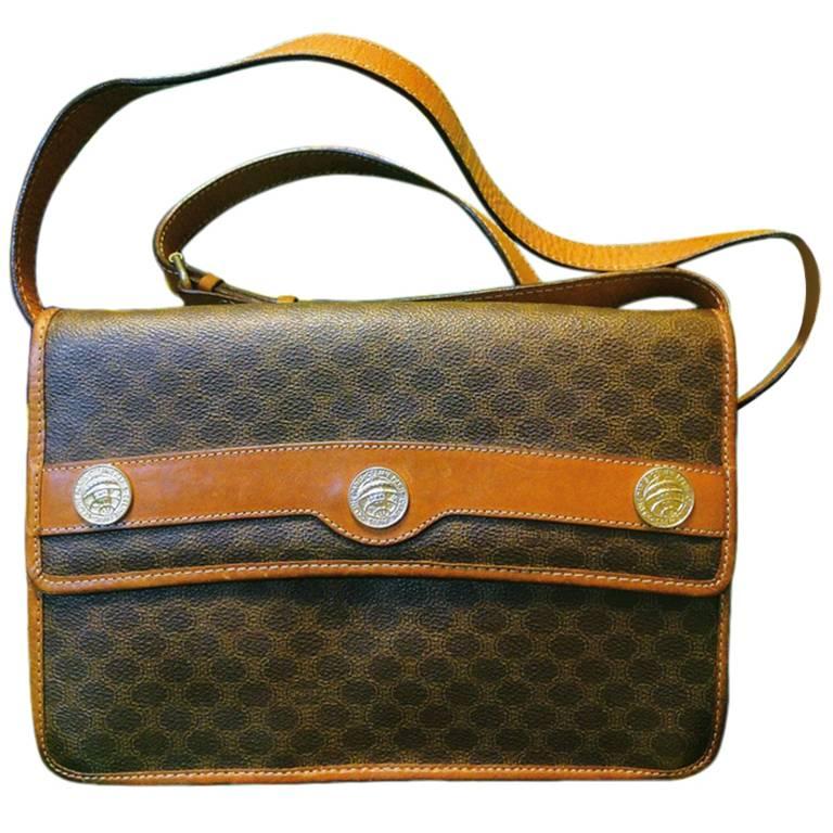 Vintage Celine iconic macadam blaison pattern shoulder bag with golden motifs.