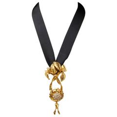 Retro 1990s Valentino Couture Black Ribbon Necklace and Gilt Fllower Pendant